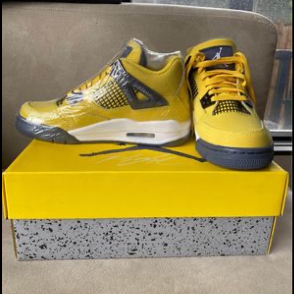 Youth Jordan 4 Lightning Sneakers.  Size 4.  Brand New.
